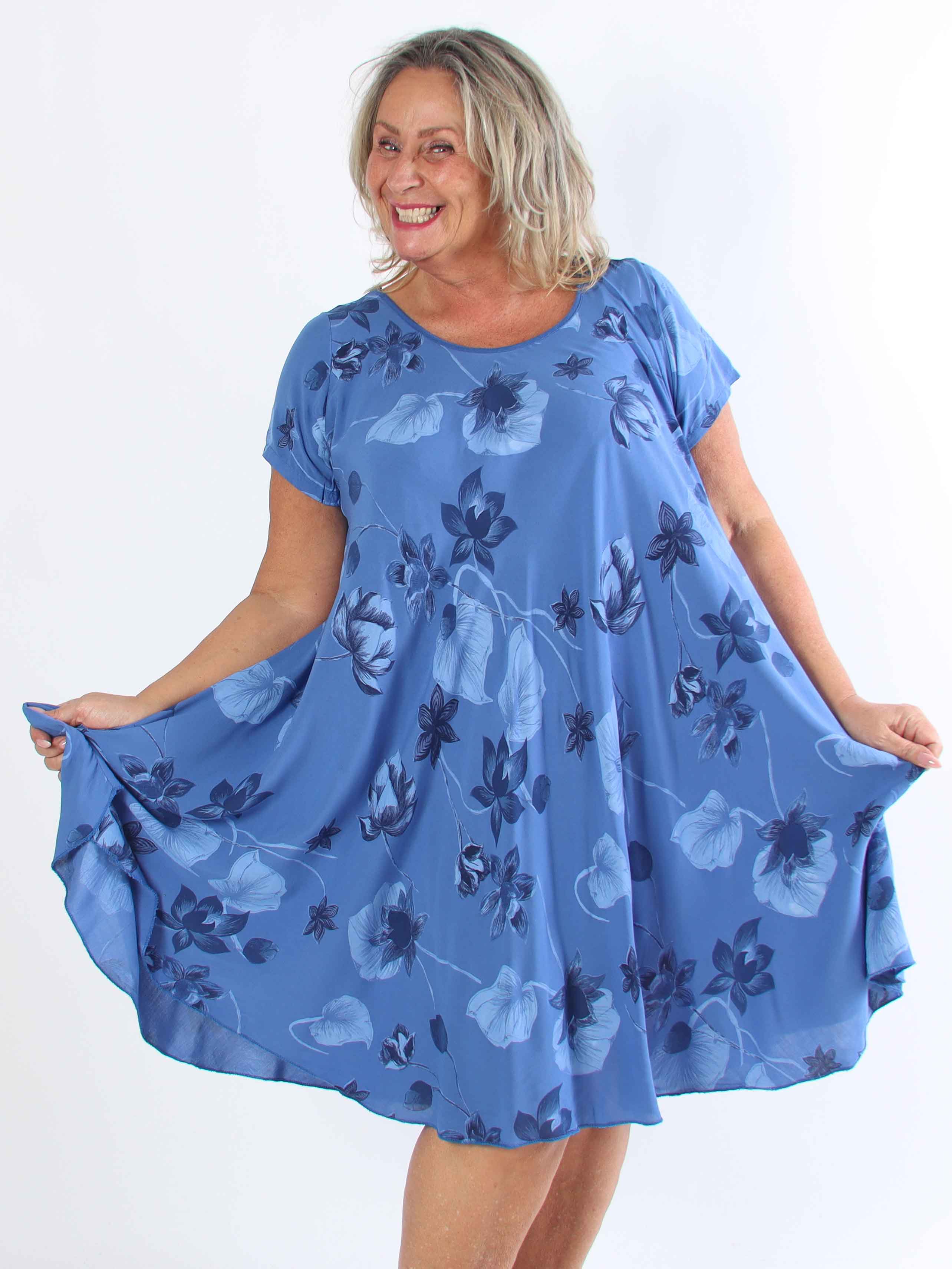 Bora - Sød plus size tunikakjole i bomuld med blomsterprint